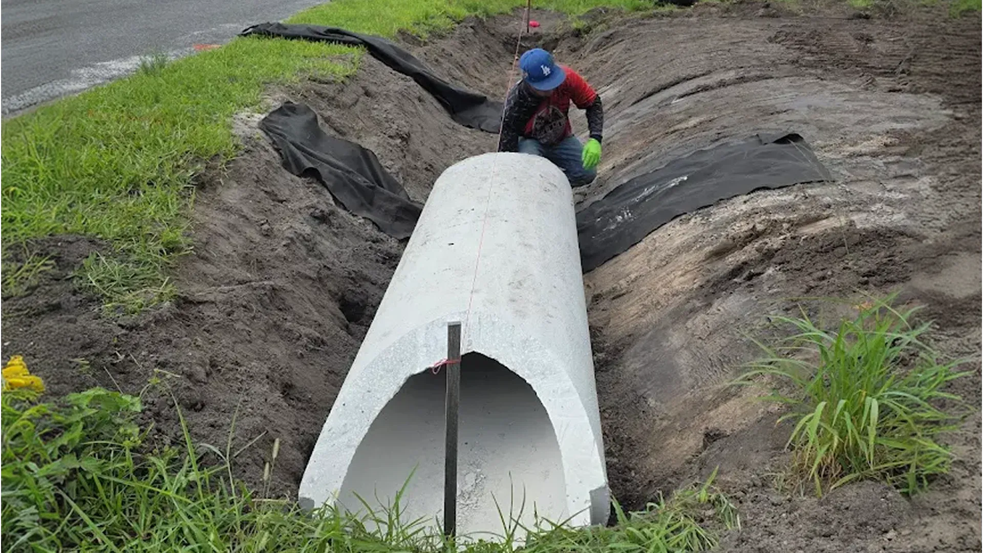 Florida grading site during rainy season with proper drainage and erosion control active Florida grading site during rainy season with proper drainage and erosion control active