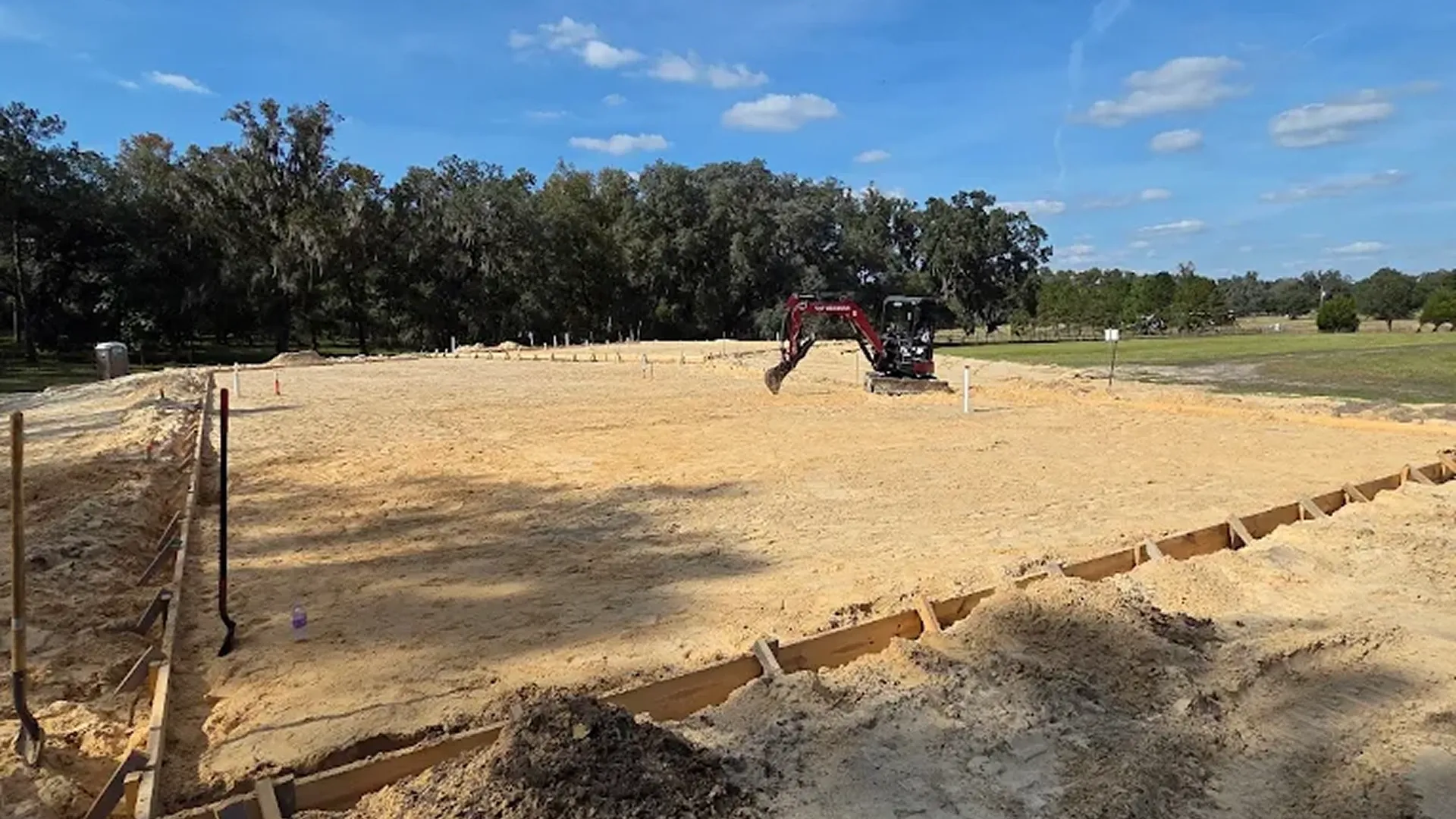 Completed_land_clearing_services_and_grading_process_Florida_lot_ready_for_construction.webp