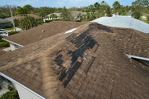 Roof with missing tiles after a storm in Central Florida Roof with missing tiles after a storm in Central Florida